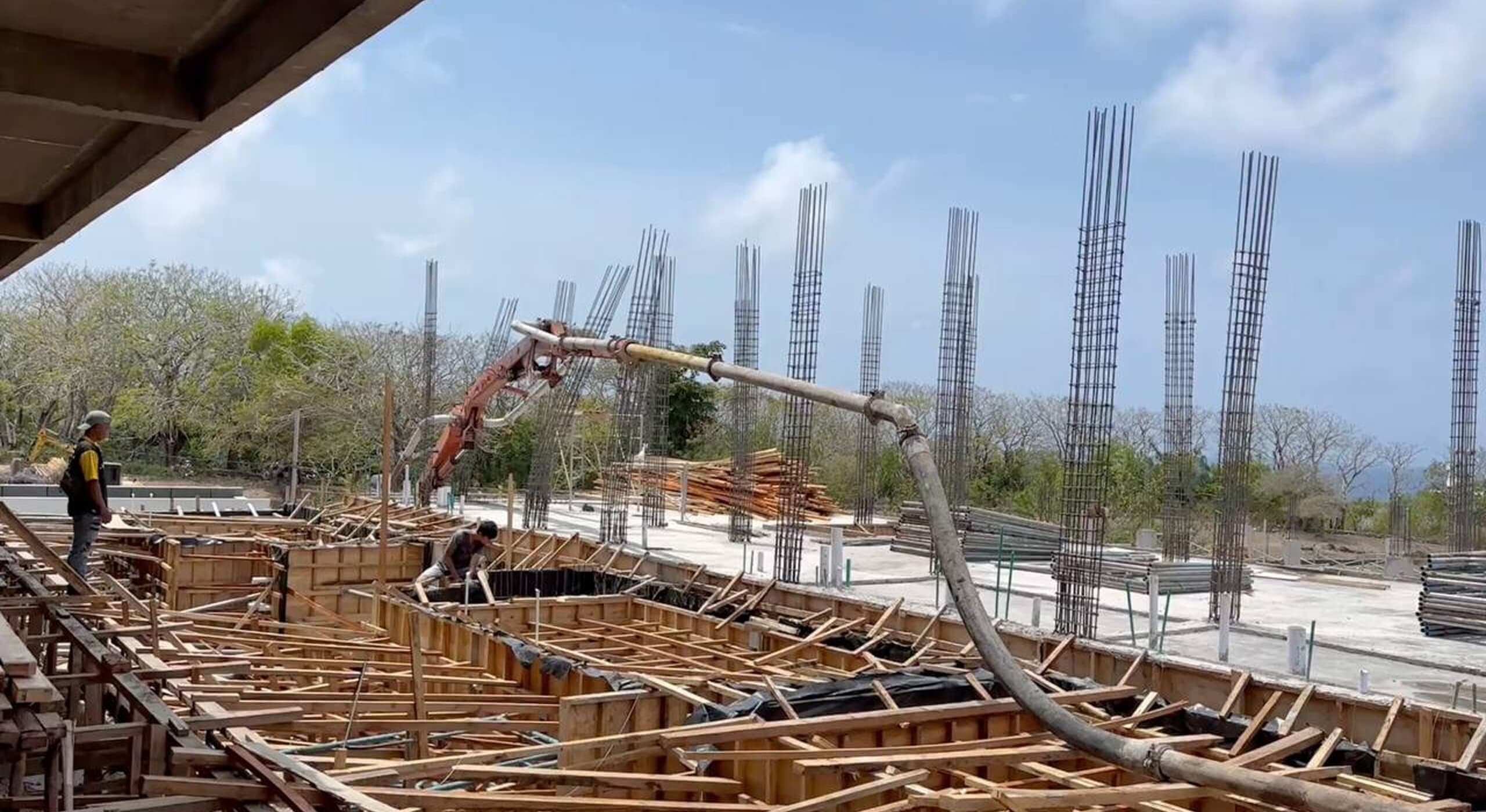 Construction progress — concrete slab pour with a boom pump — Frigate Bali