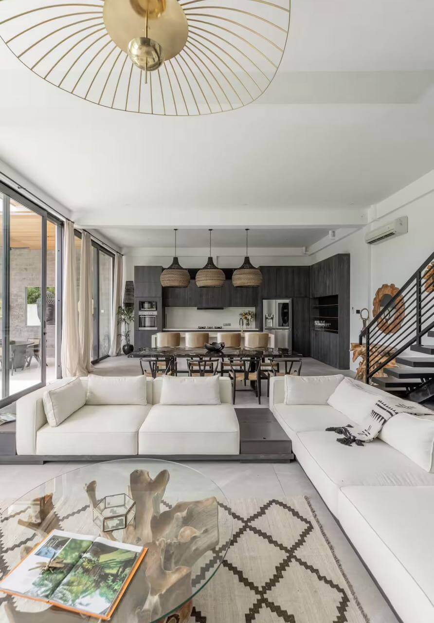 Open-plan villa interior with living room, dining area and kitchen — Frigate Bali
